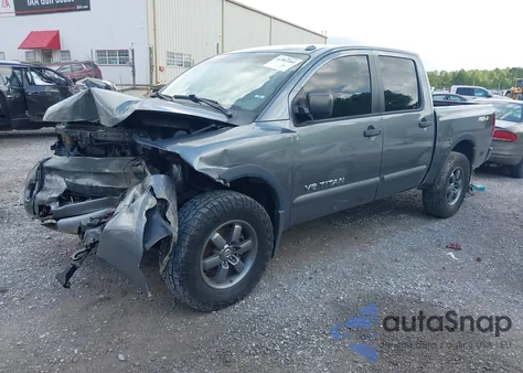2014 Nissan Titan Pro-4X z USA, uszkodzony, nr VIN 1N6BA0EC4EN509573